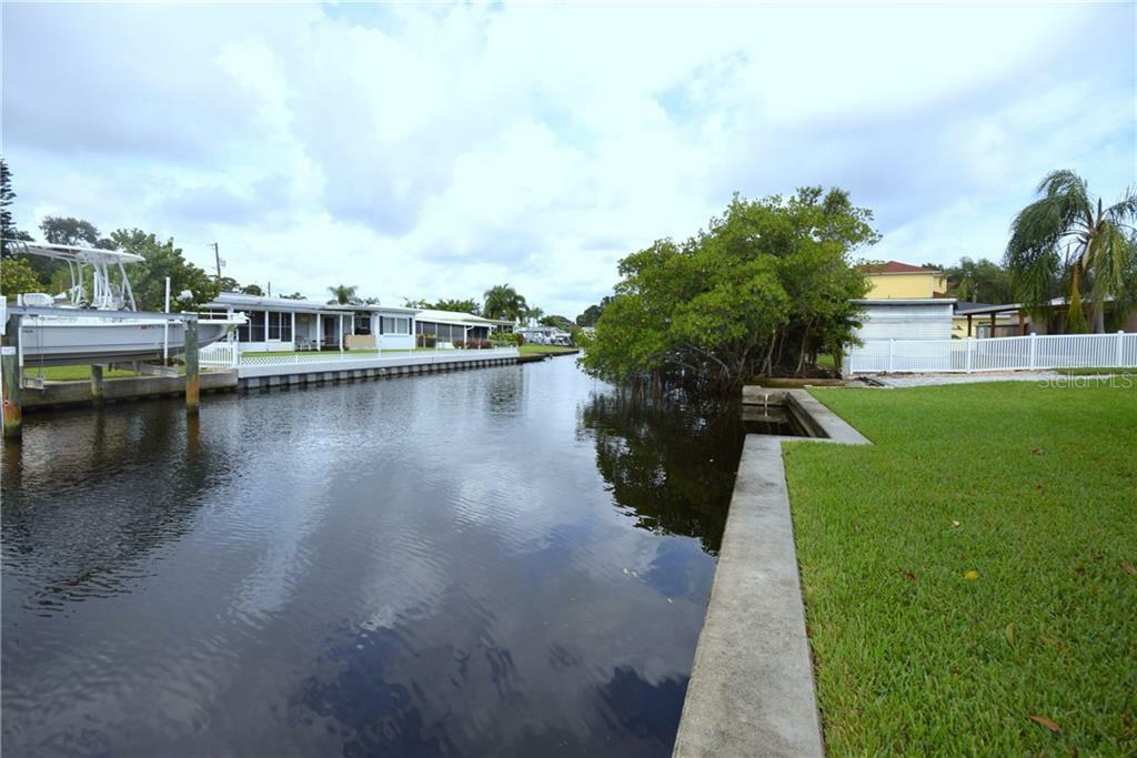 Property Photo:  9046 Treasure Lane NE  FL 33702 