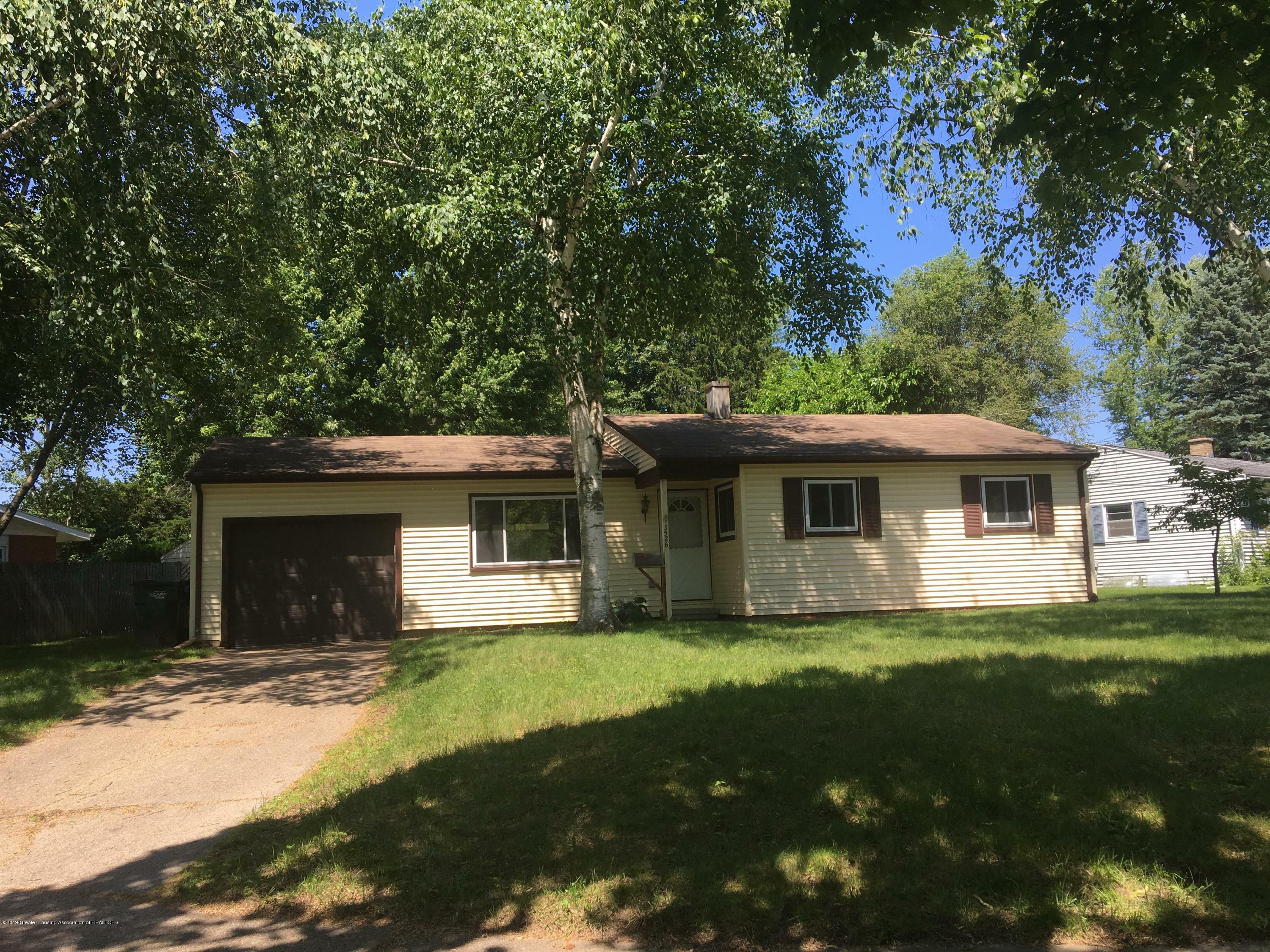 Property Photo:  3526 Harold Street  MI 48910 