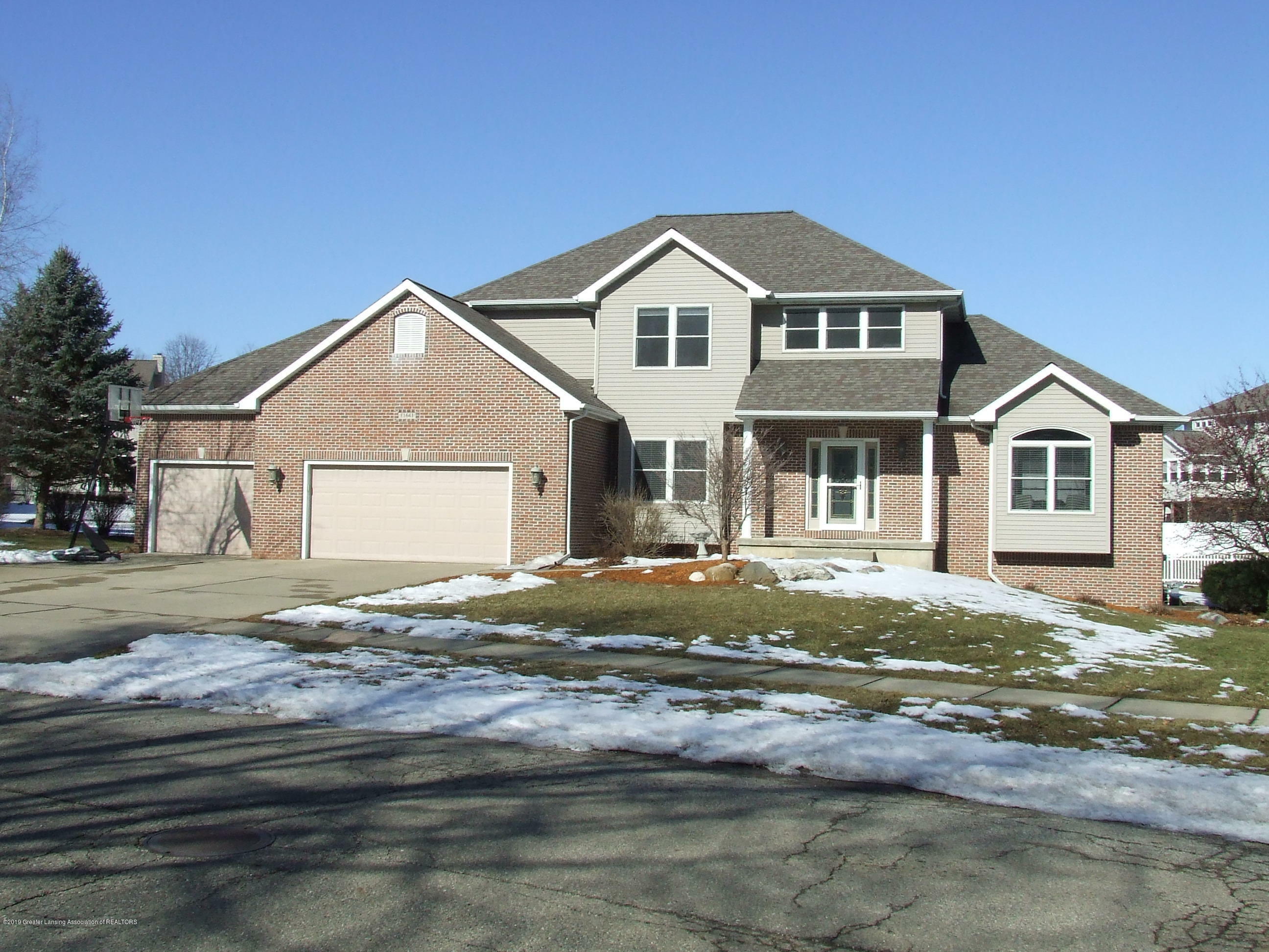 Property Photo:  11641 Millstone Drive  MI 48837 