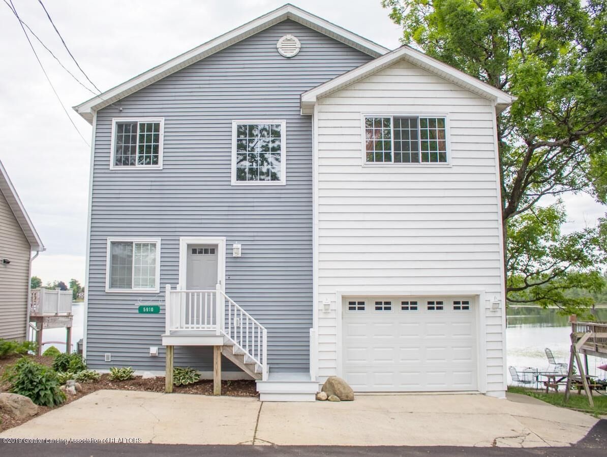 Property Photo:  5910 Hickory Hill Drive  MI 48848 