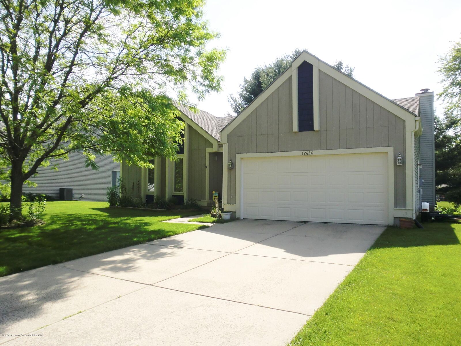 Property Photo:  12626 Houghton Drive  MI 48820 
