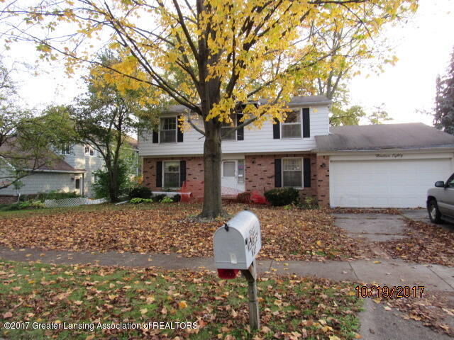 Property Photo:  1980 Wembley Way  MI 48823 