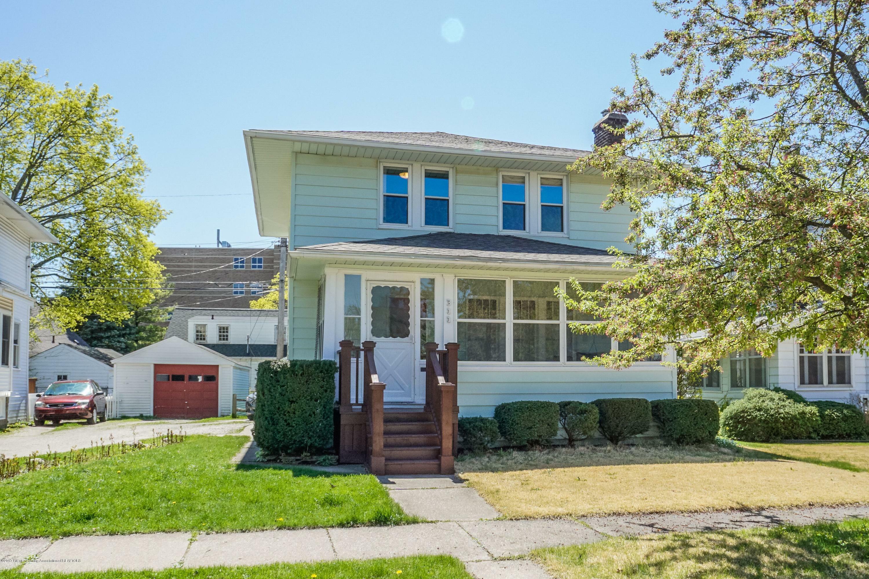 Property Photo:  311 Strathmore Road  MI 48910 