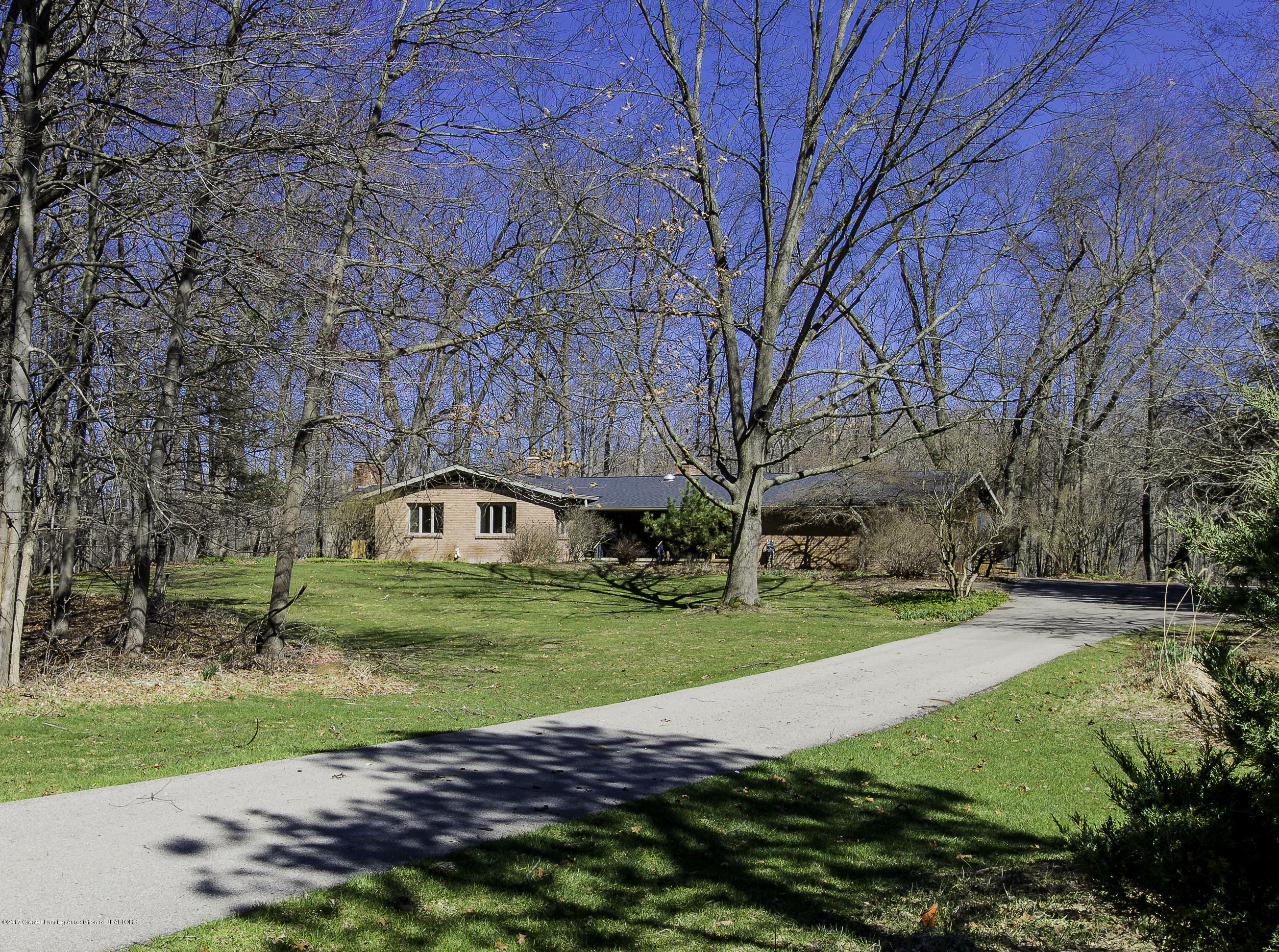 Property Photo:  4990 Country Drive  MI 48864 