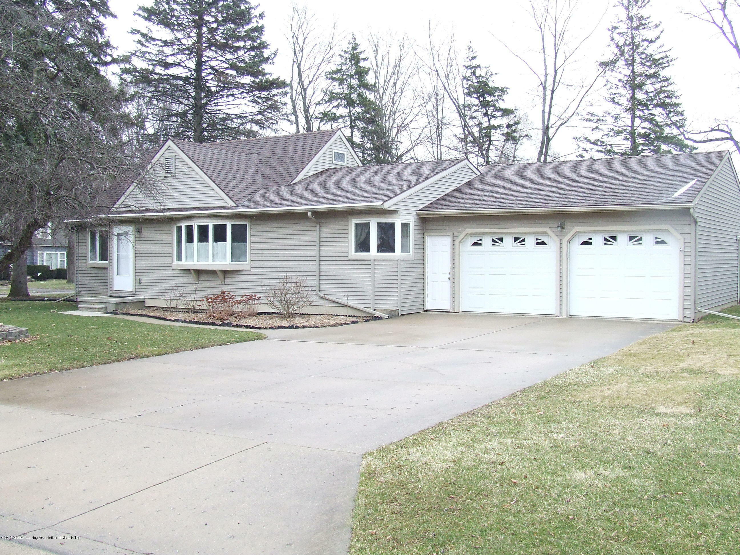 Property Photo:  1046 Maycroft Road  MI 48917 