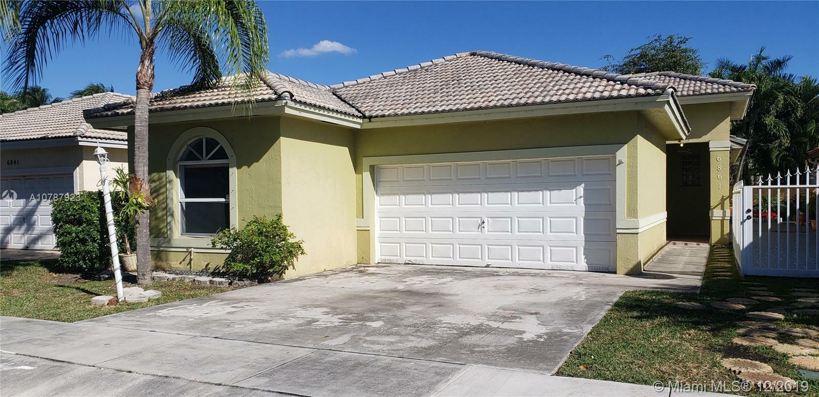 Property Photo:  6861 SW 160th Ct  FL 33193 