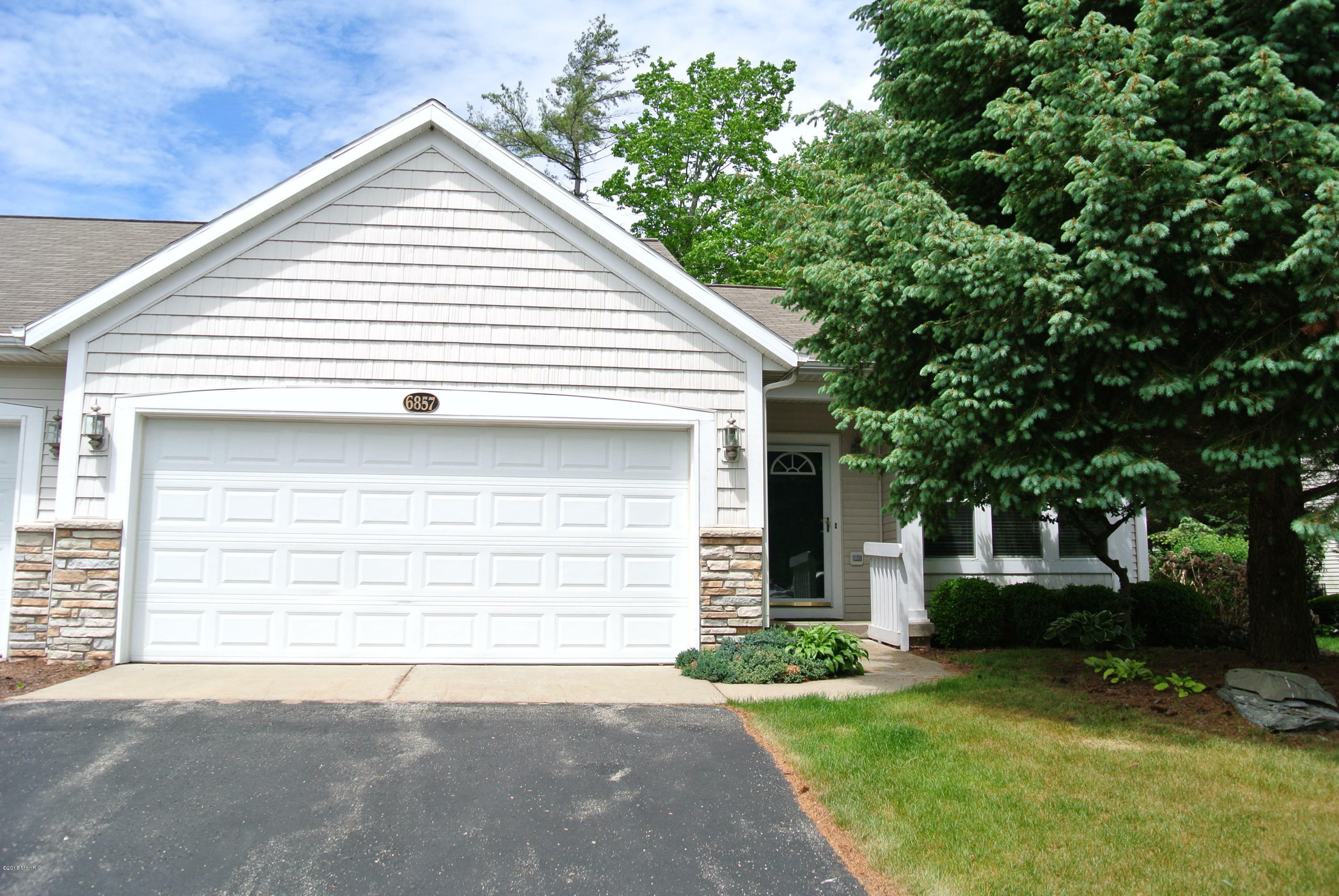 Property Photo:  6857 Windwater Court  MI 49444 