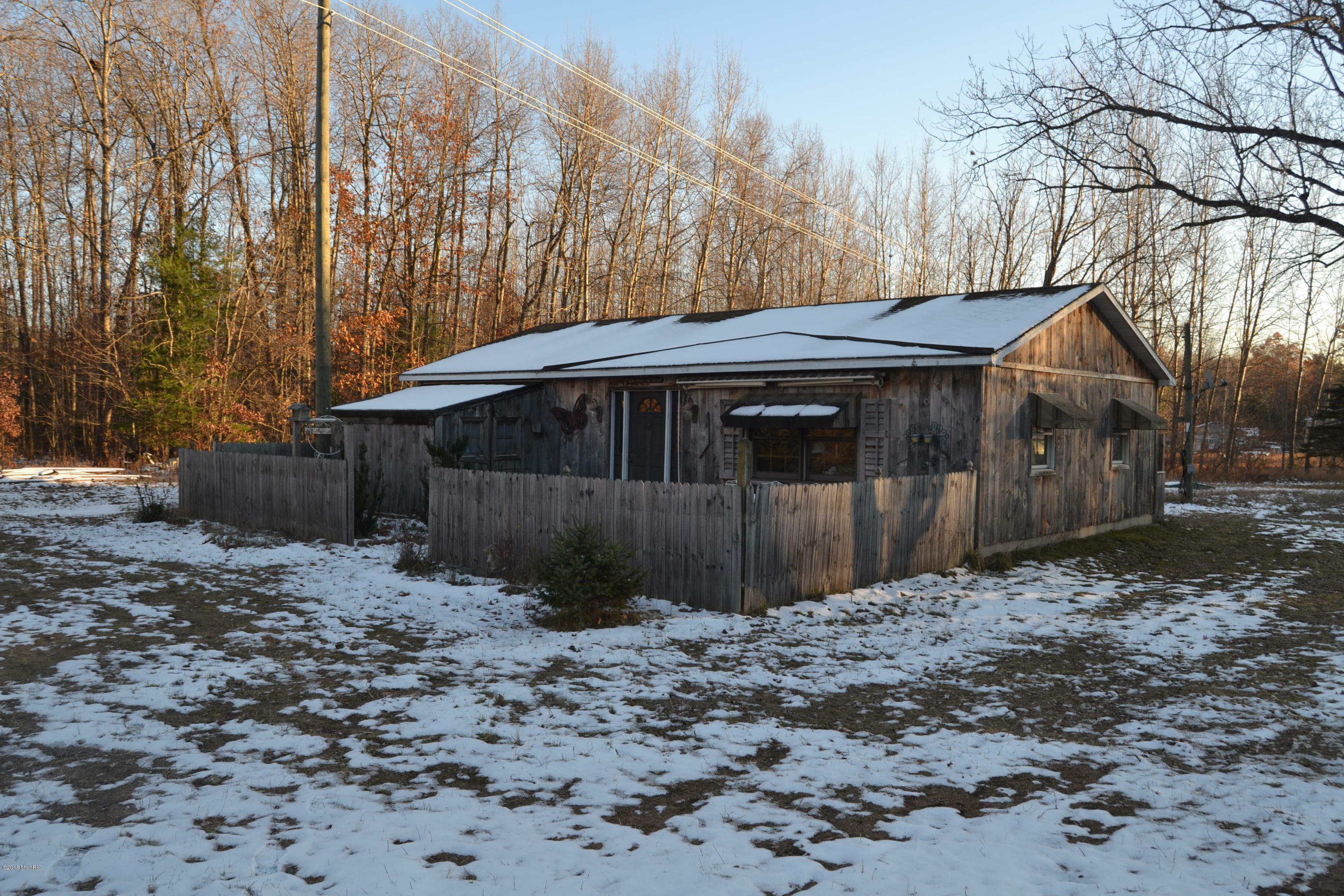 Property Photo:  5031 E Loop Road  MI 49421 