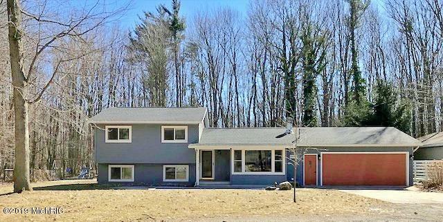 Property Photo:  6081 Post Road  MI 49437 