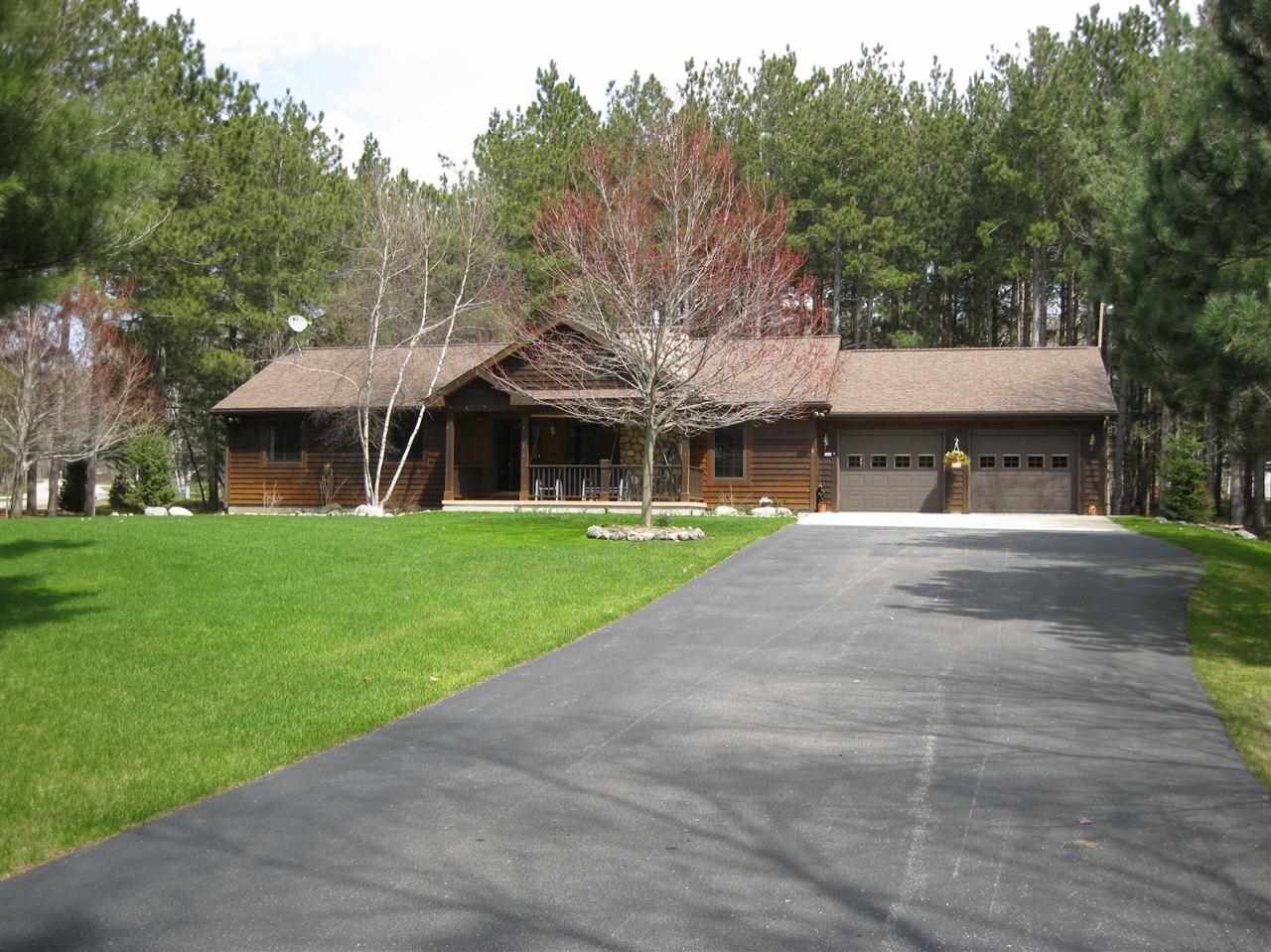 Property Photo:  3891 Island Watch  MI 49740 