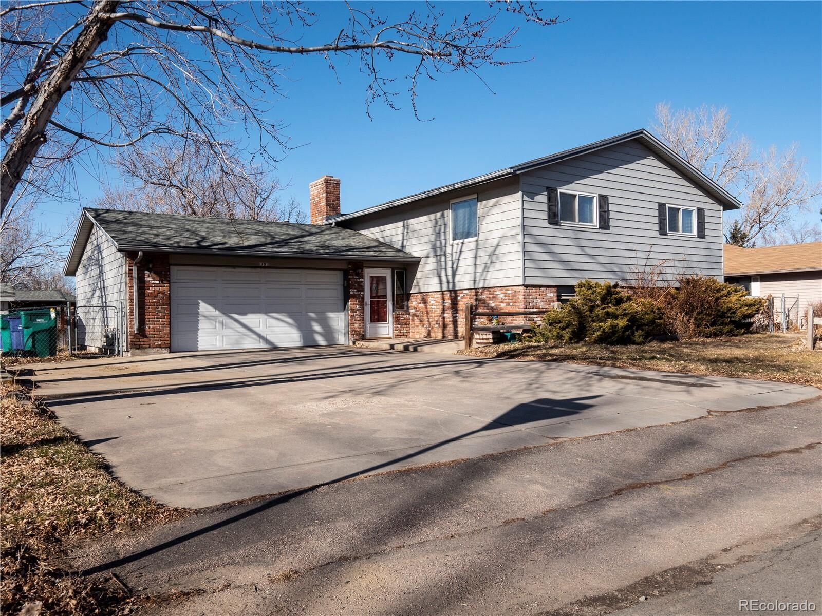 Property Photo:  1701 Biscay Street  CO 80011 