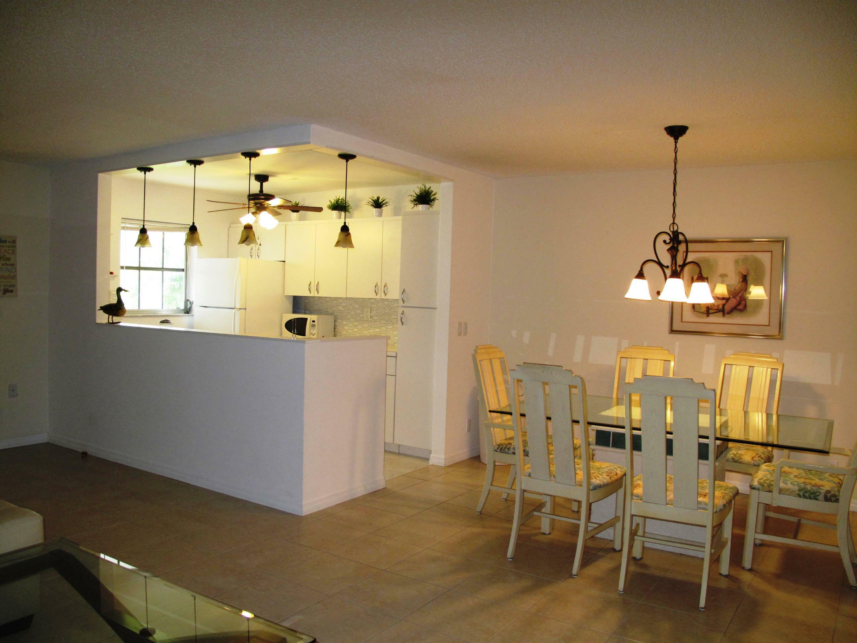 Property Photo:  1135 South Drive C  FL 33445 