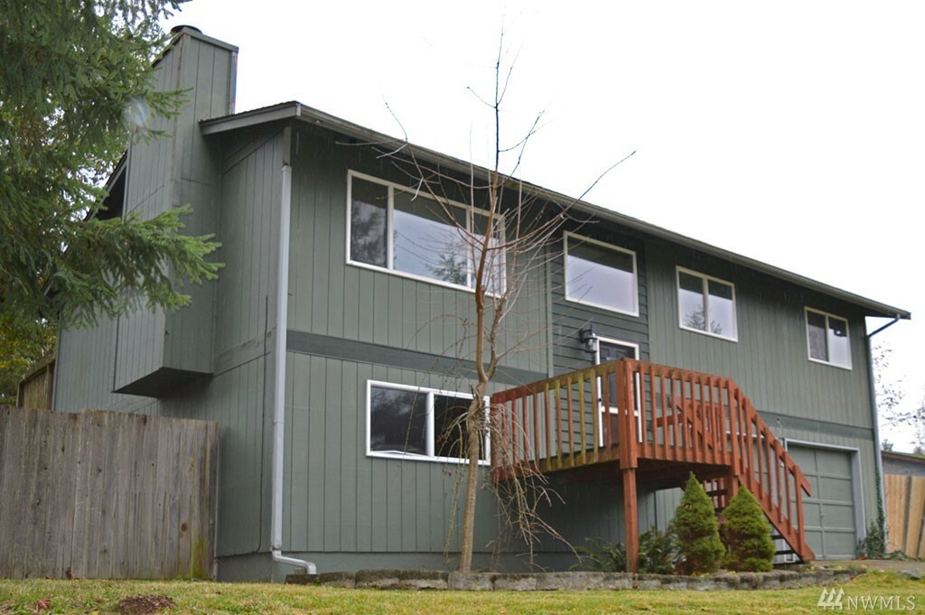 Property Photo:  7014 Locust Ave E  WA 98391 