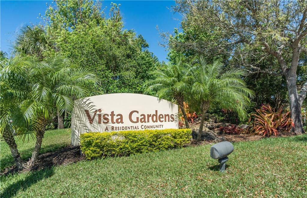 Property Photo:  12 Vista Gardens Trail 203  FL 32962 