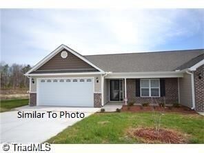 Property Photo:  210 Oak Ridge Drive  NC 27263 