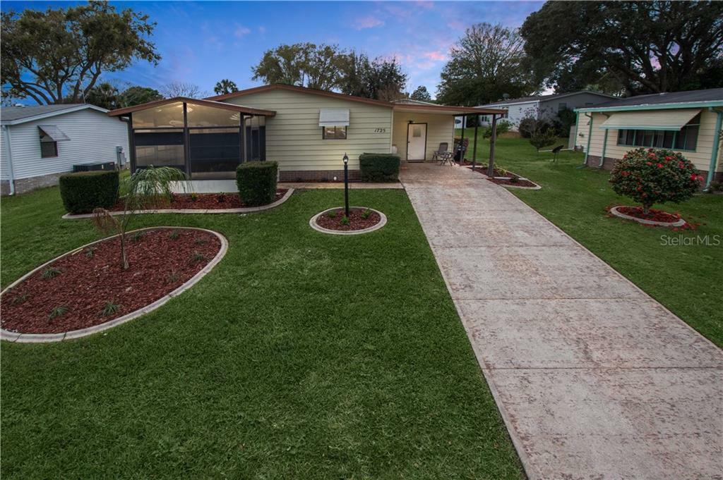 Property Photo: 1725 Pebble Beach Lane FL 32159