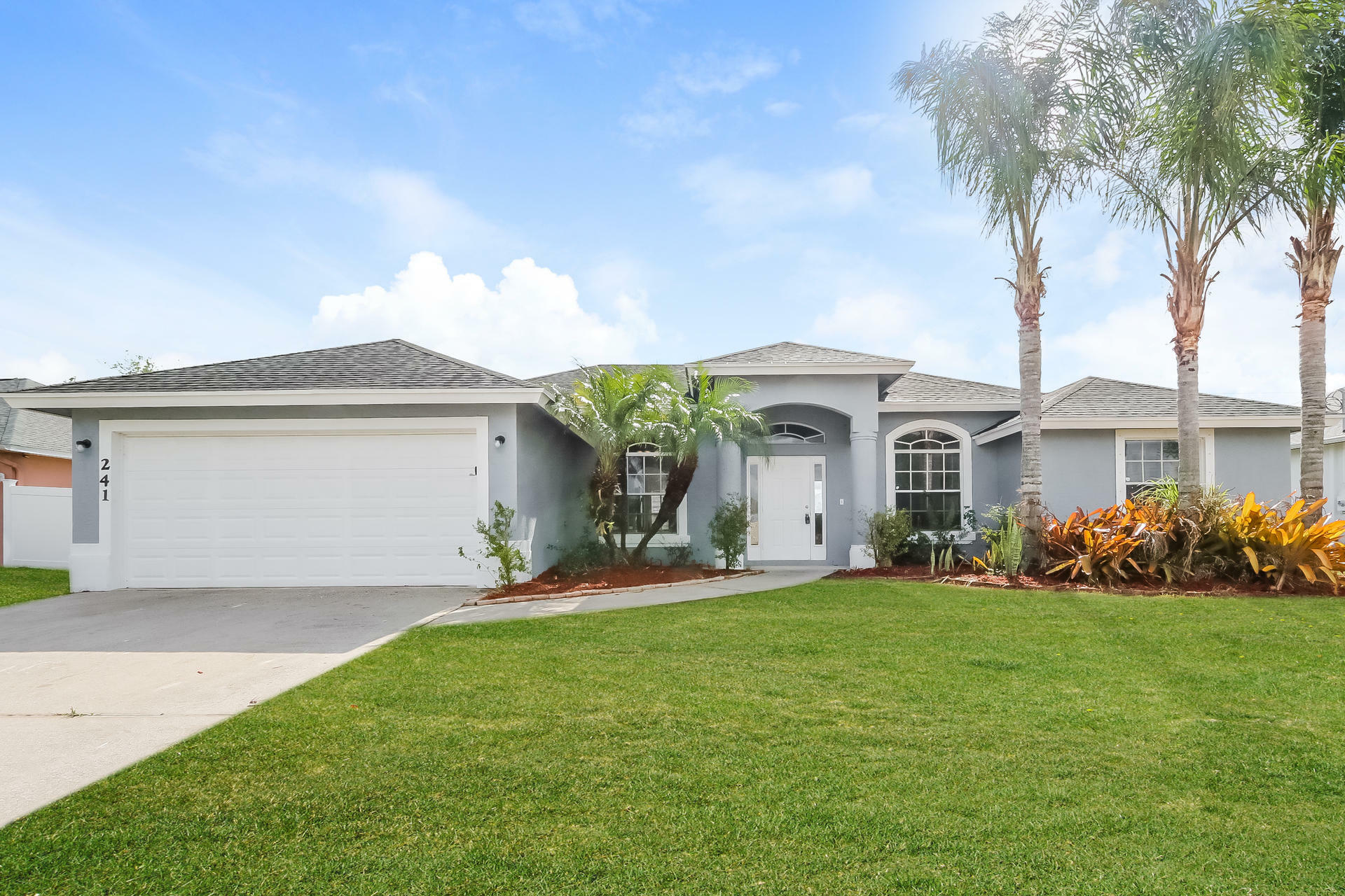 Property Photo:  241 SW South Quick Circle  FL 34953 