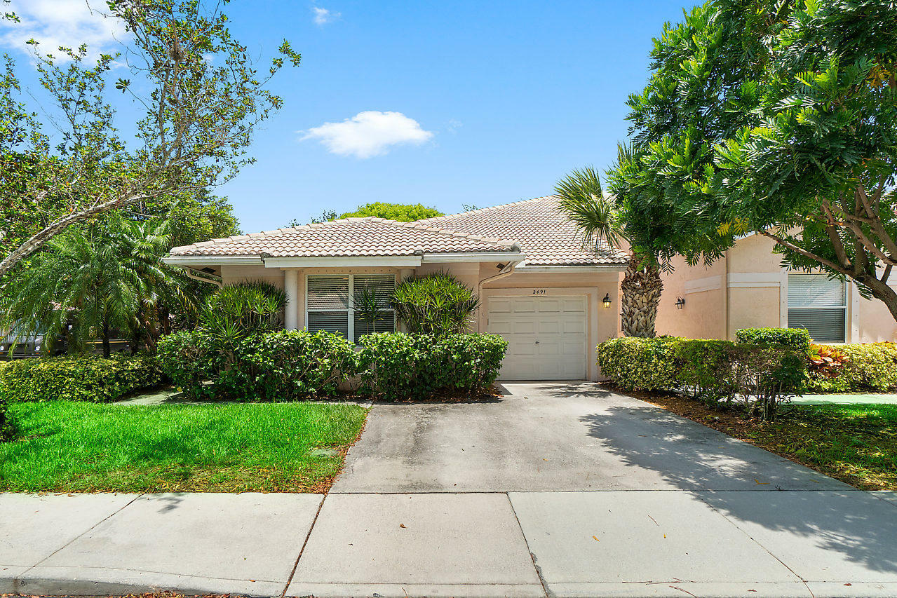 Property Photo:  2491 S Coral Trace Circle  FL 33445 