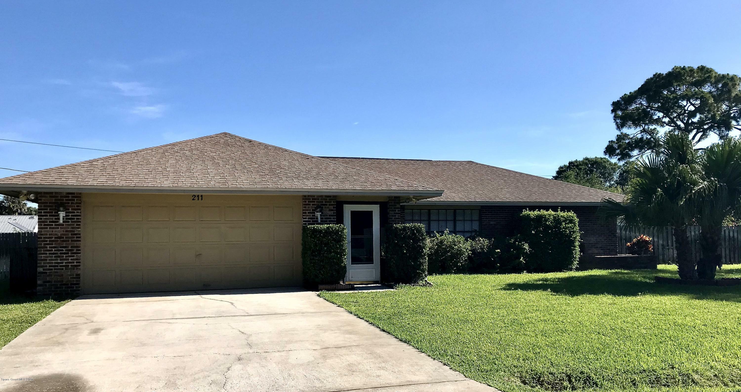 Property Photo:  211 Dickinson Street NE  FL 32907 