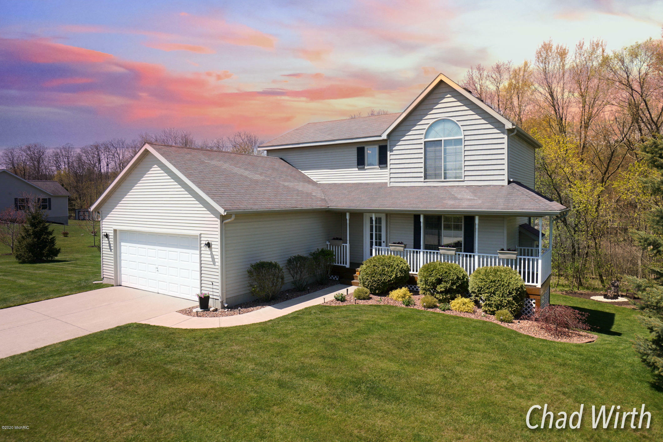 Property Photo: 10295 Meadowgate Drive NE MI 49345