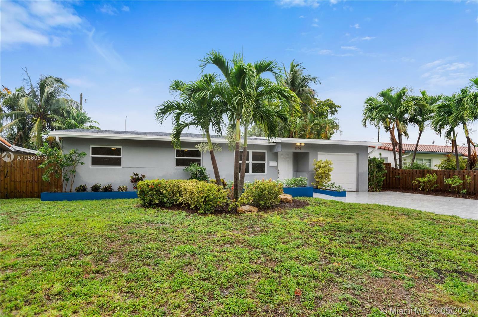 Property Photo: 1944 NE 26th Dr FL 33306