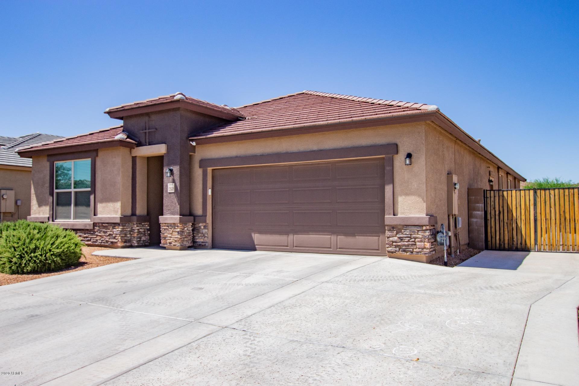 Property Photo:  13568 W Desert Moon Way  AZ 85383 