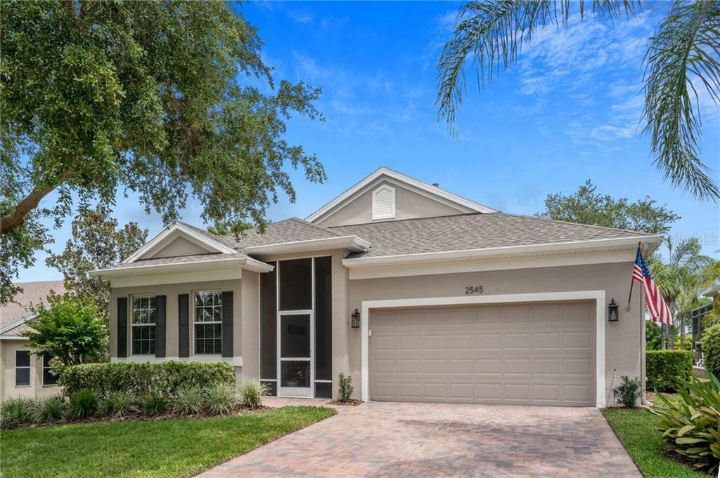 Property Photo:  2545 Castle Pines Street  FL 34711 