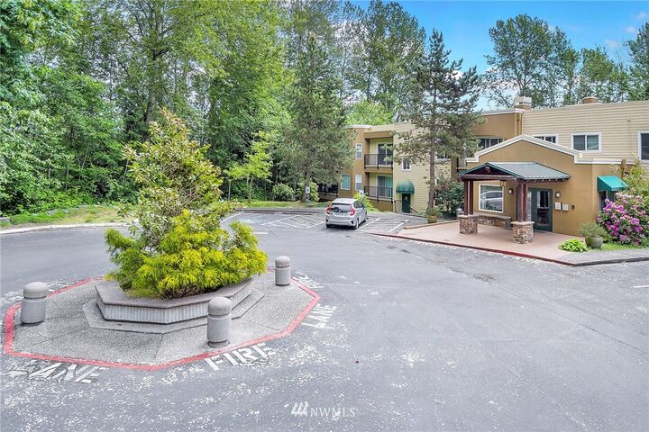 Property Photo:  12439 NE Totem Lake Way 209  WA 98034 