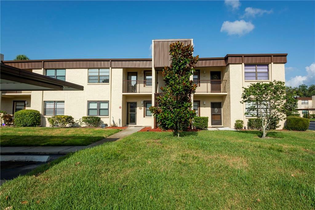 Property Photo:  2400 Winding Creek Boulevard 9-203  FL 33761 