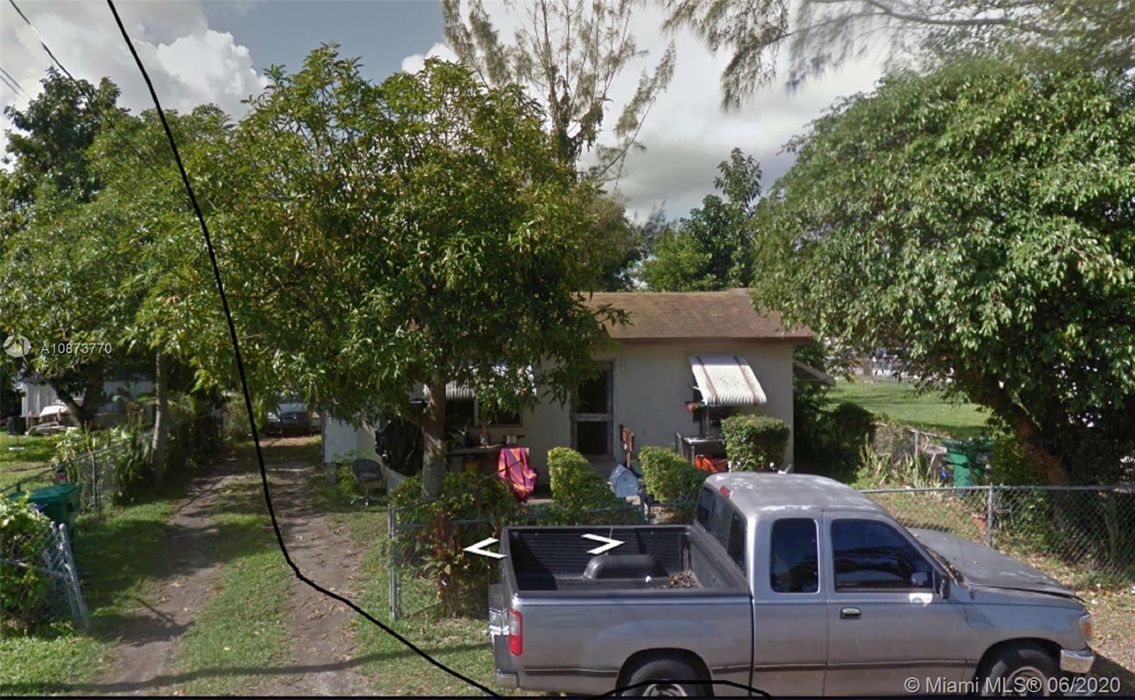 Property Photo:  21450 SW 120th Ave  FL 33177 