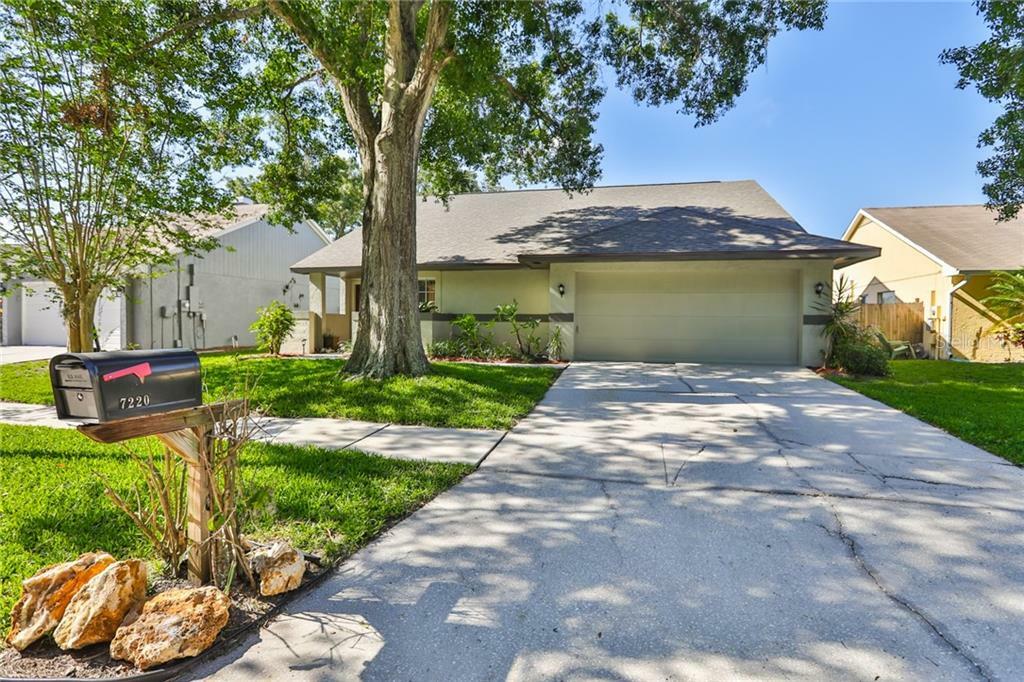 Property Photo:  7220 Hollowell Drive  FL 33634 