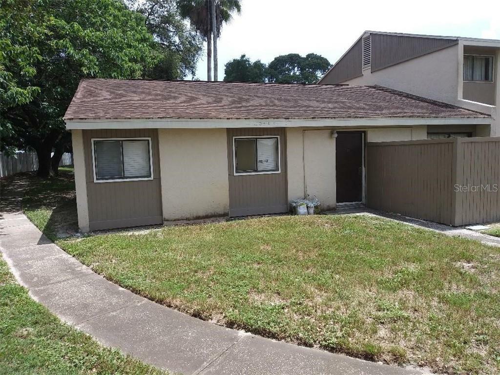 Property Photo:  8016 Peach Drive 100  FL 33637 