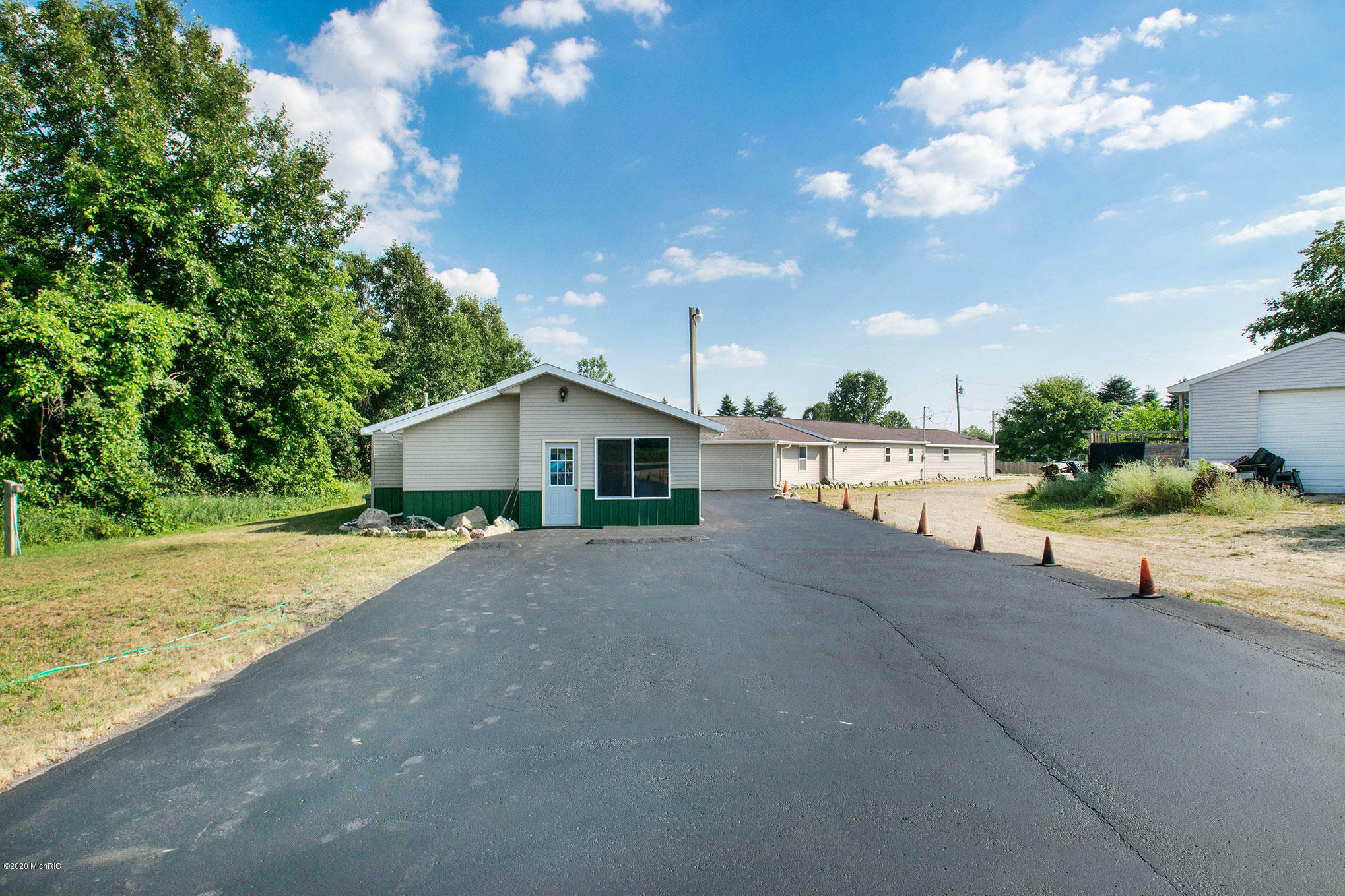 Property Photo:  210 E Parmeter Road  MI 48846 