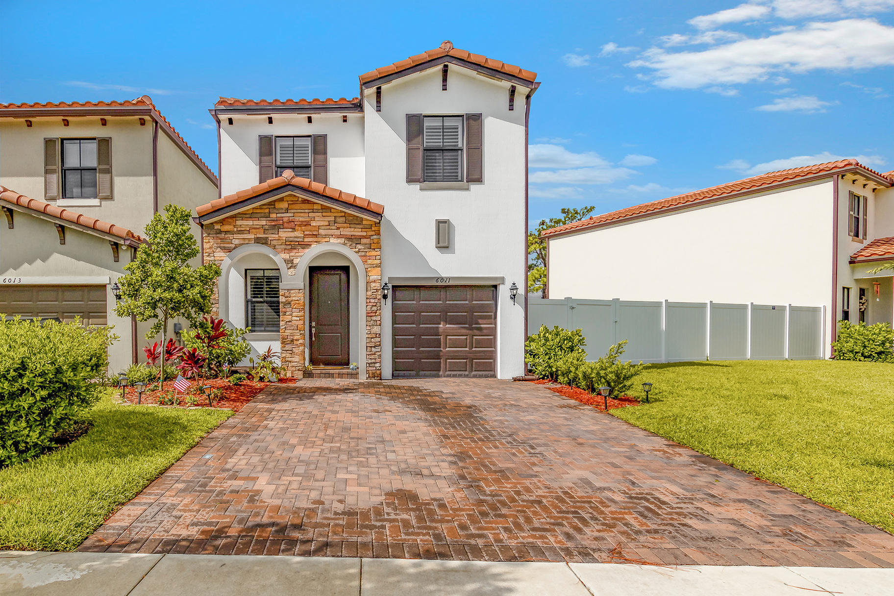 Property Photo: 6011 Pine Tree Way FL 33410