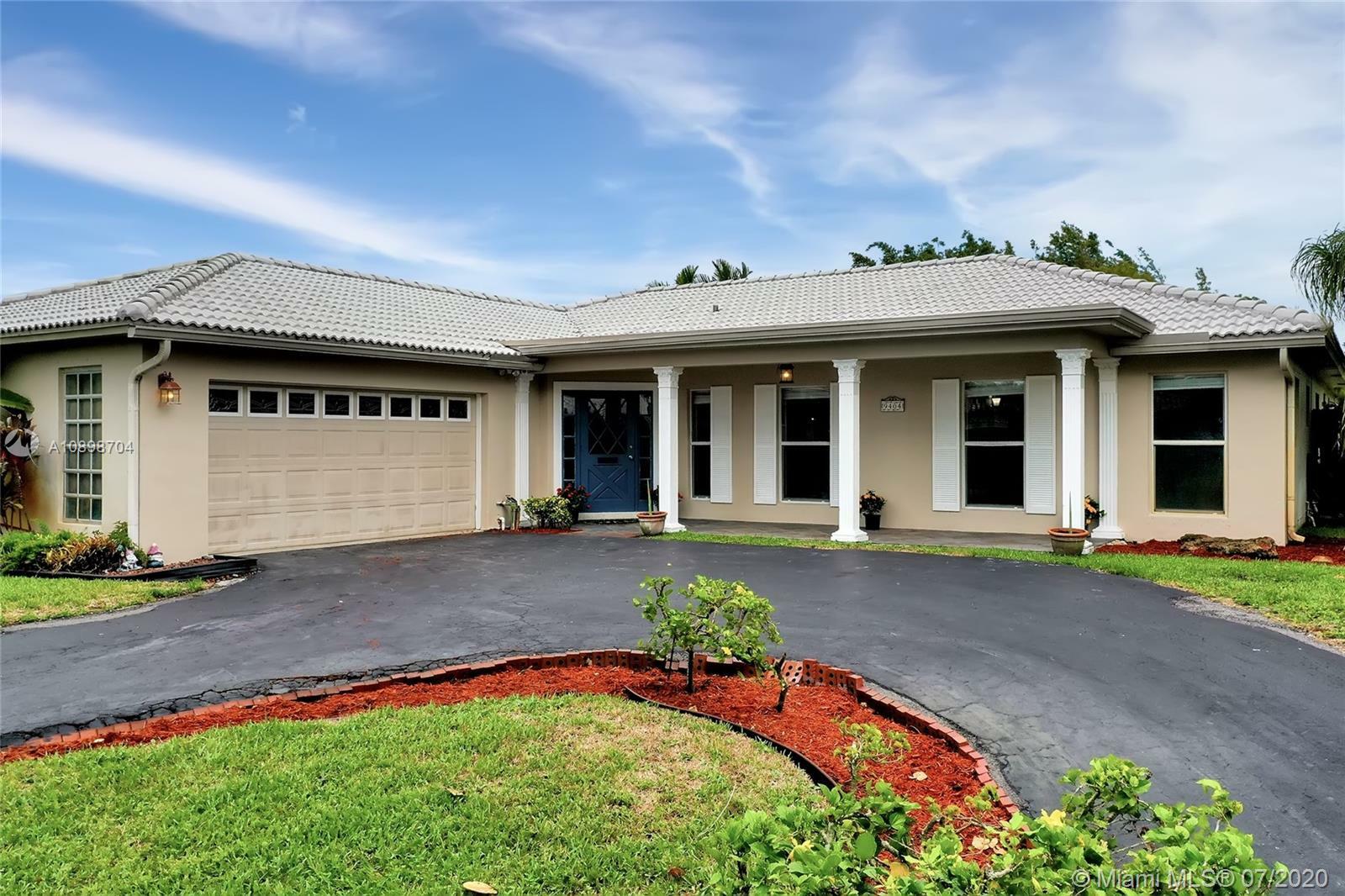 Property Photo:  9404 NW 37th Ct  FL 33065 