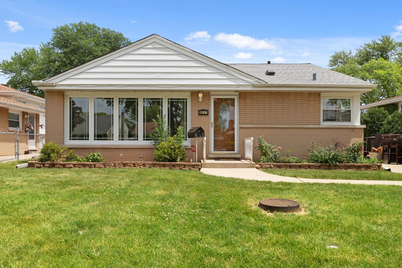 Property Photo:  8837 North Merrill Street  IL 60714 