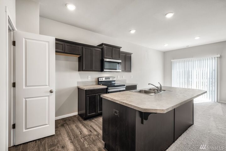 Property Photo:  18218 107th Ave E 448  WA 98374 