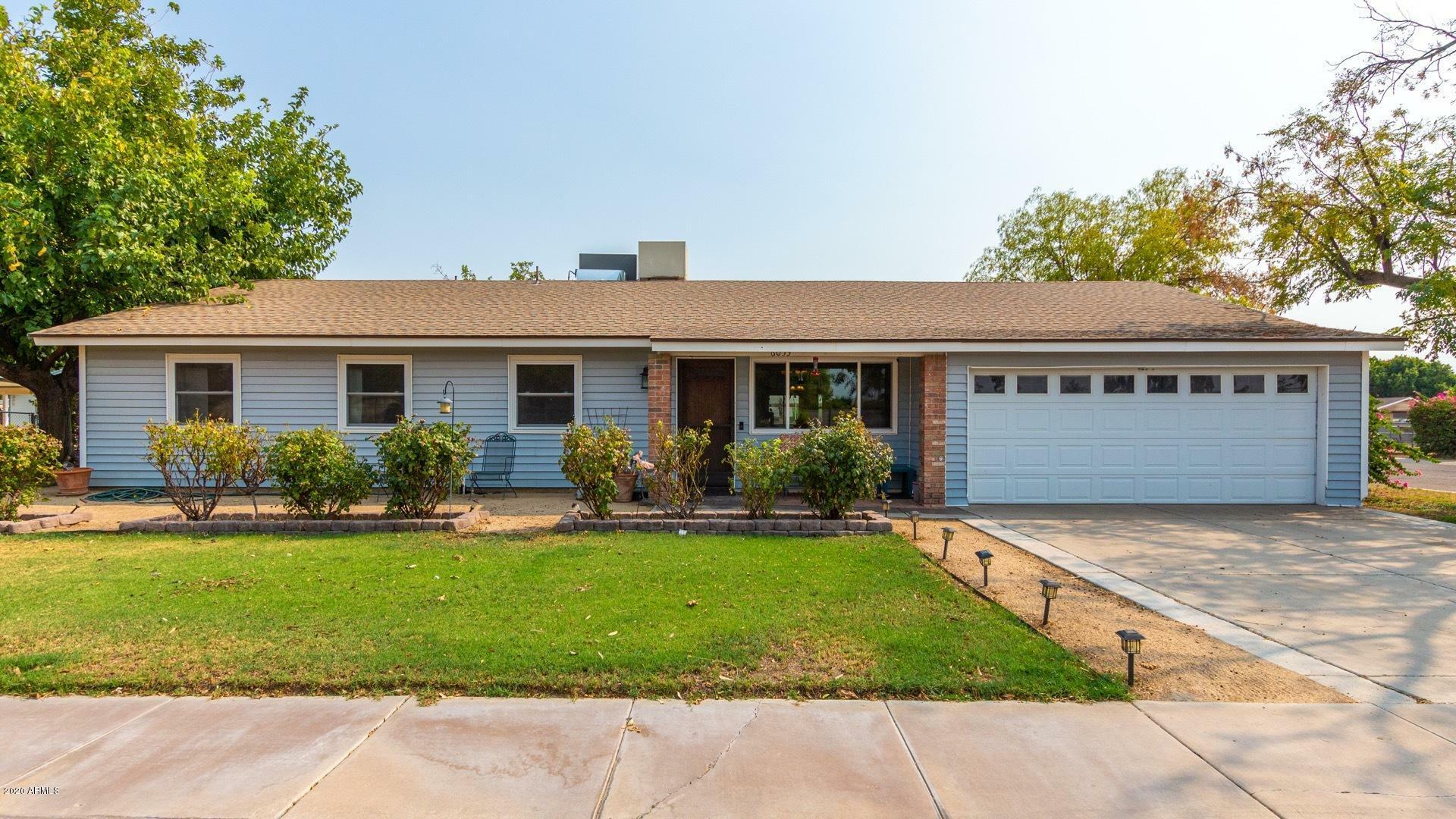 Property Photo:  6053 W Monte Cristo Avenue  AZ 85306 