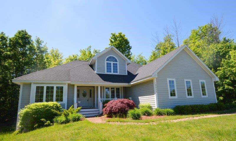 Property Photo:  10032 Timber Valley  MI 49676 