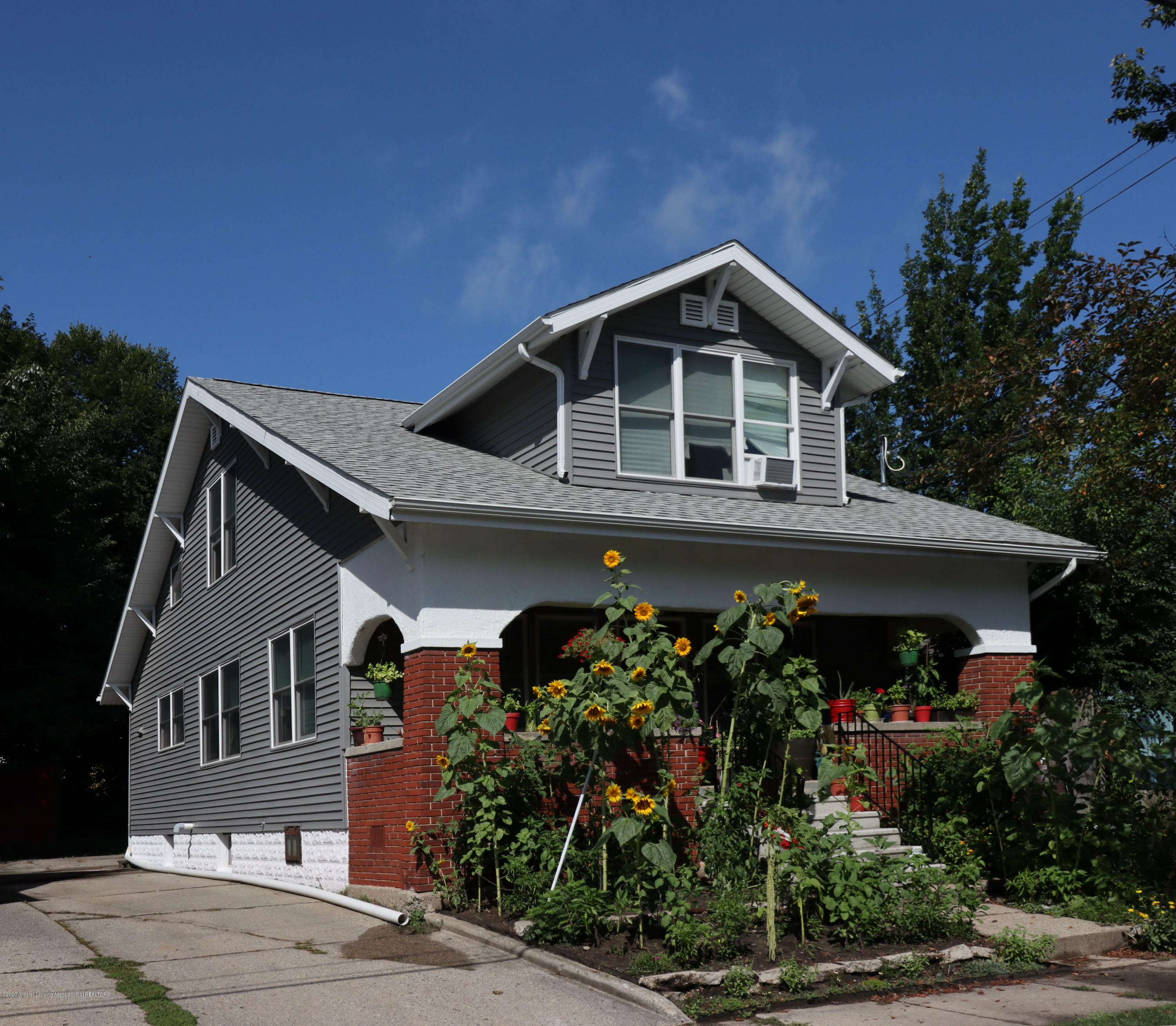 Property Photo:  1612 Stirling Avenue  MI 48910 