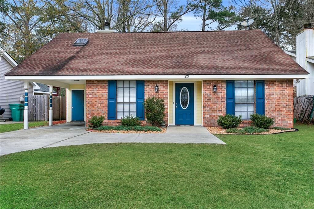 Property Photo: 42 Cypress Meadow Loop LA 70460