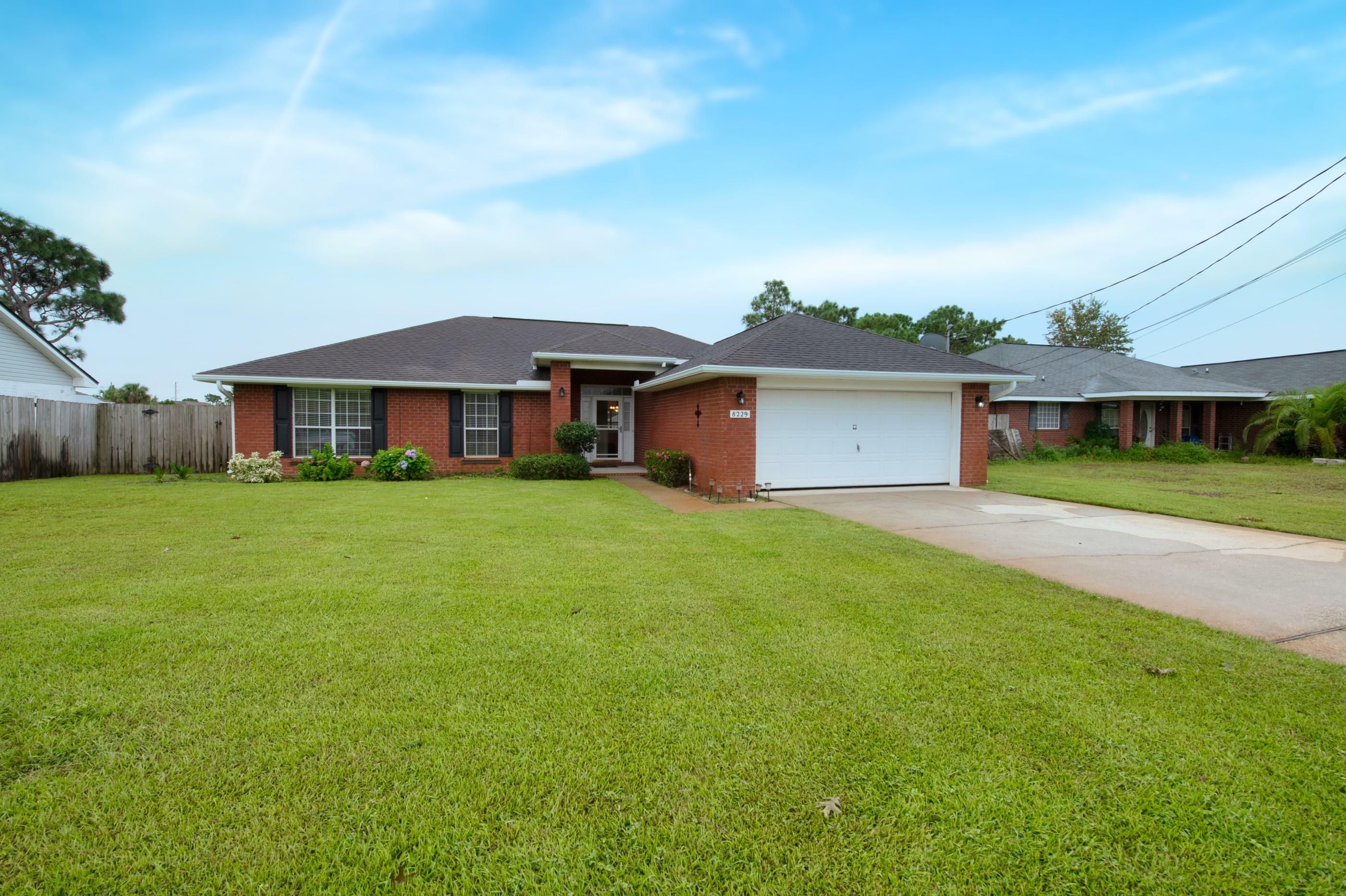 Property Photo:  8229 Hartington Drive  FL 32566 