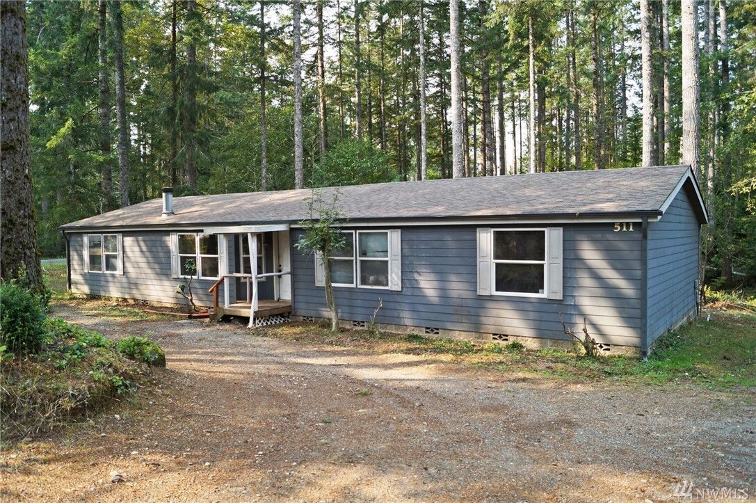 Property Photo: 511 E Timberlakes Dr E WA 98584