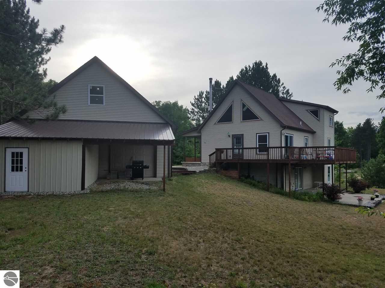 Property Photo:  8433 Dell Road  MI 49649 