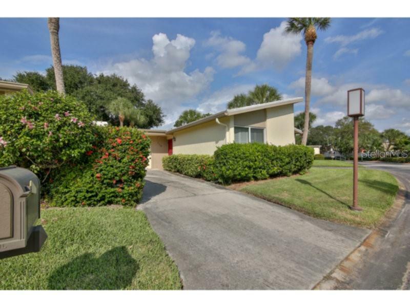 Property Photo:  115 Whispering Sands Circle V-37  FL 34242 