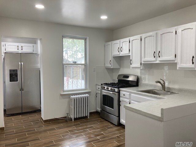 Property Photo: 114-08 128th Street 1st Fl NY 11420
