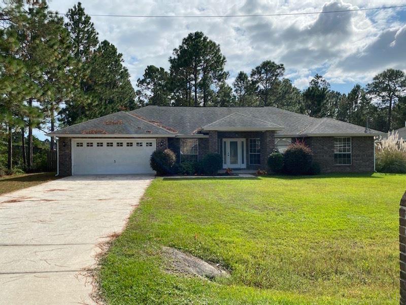 Property Photo: 7409 Treasure St FL 32566