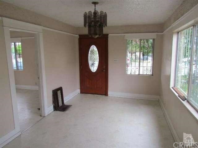 Property Photo:  8629 Grape Street  CA 90002 