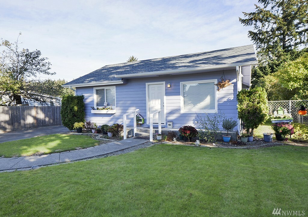 Property Photo: 6607 S Wapato St WA 98409