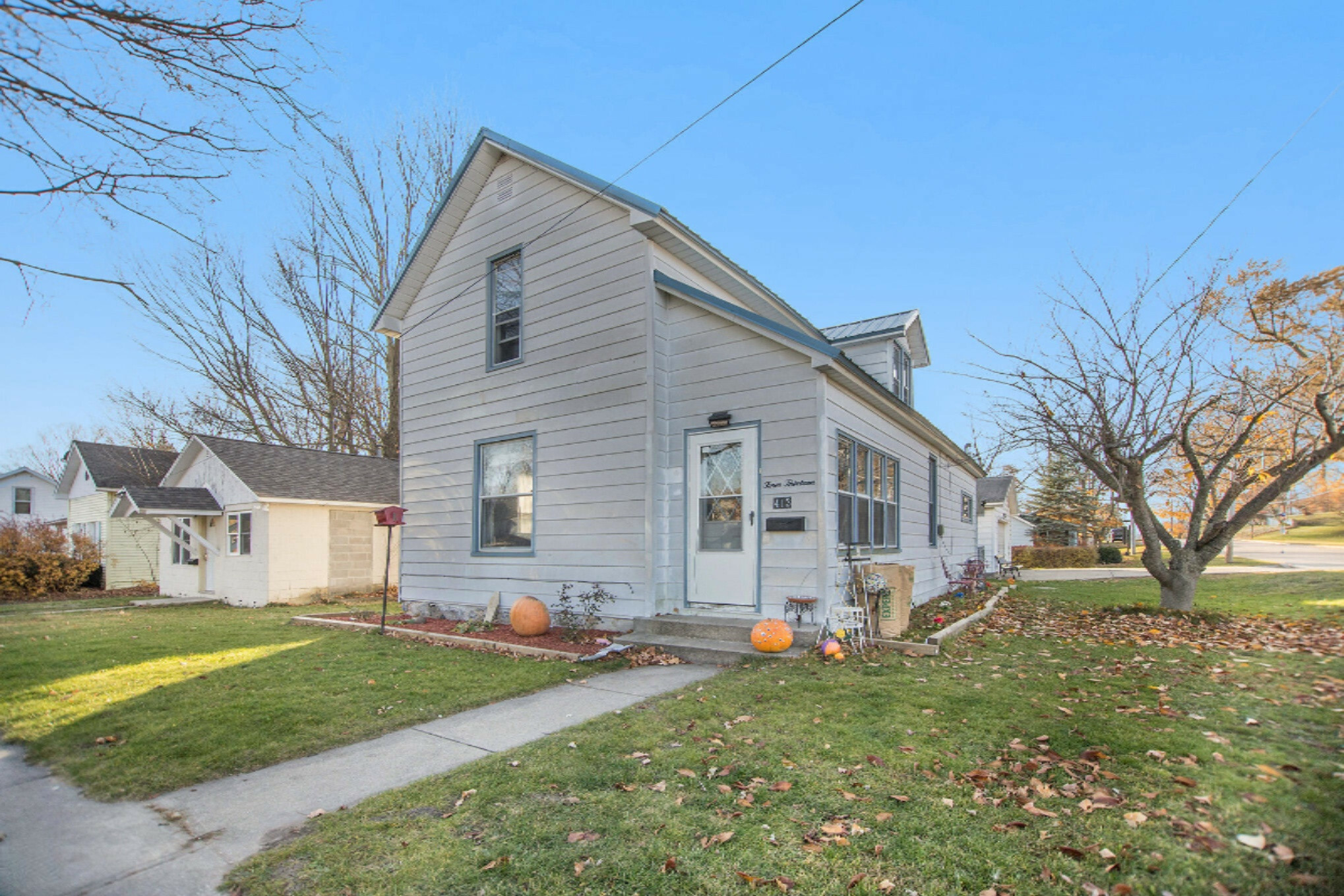 Property Photo:  413 N Maple Street  MI 49455 